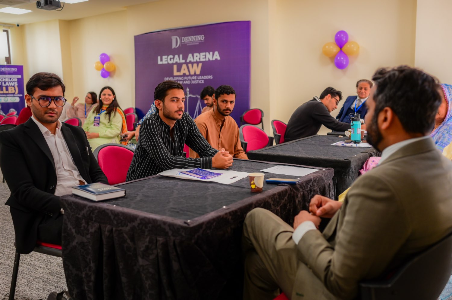 Students in discussion at the open house