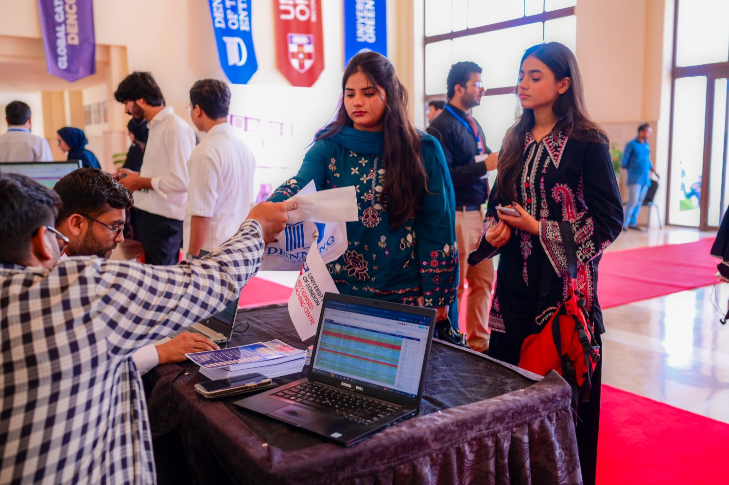 Admissions guidance at the registration desk